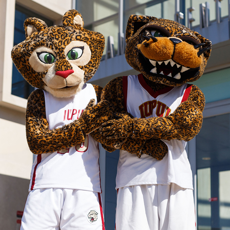 Jazzy and Jawz pose outside of the campus center.